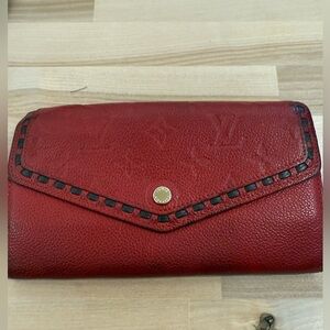 LOUIS VUITTON 
Empreinte Sarah Wallet Red Scarlet